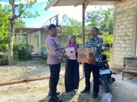 Pemerintah Kalurahan Pampang Salurkan Bantuan Sembako kepada Korban Pohon Tumbang